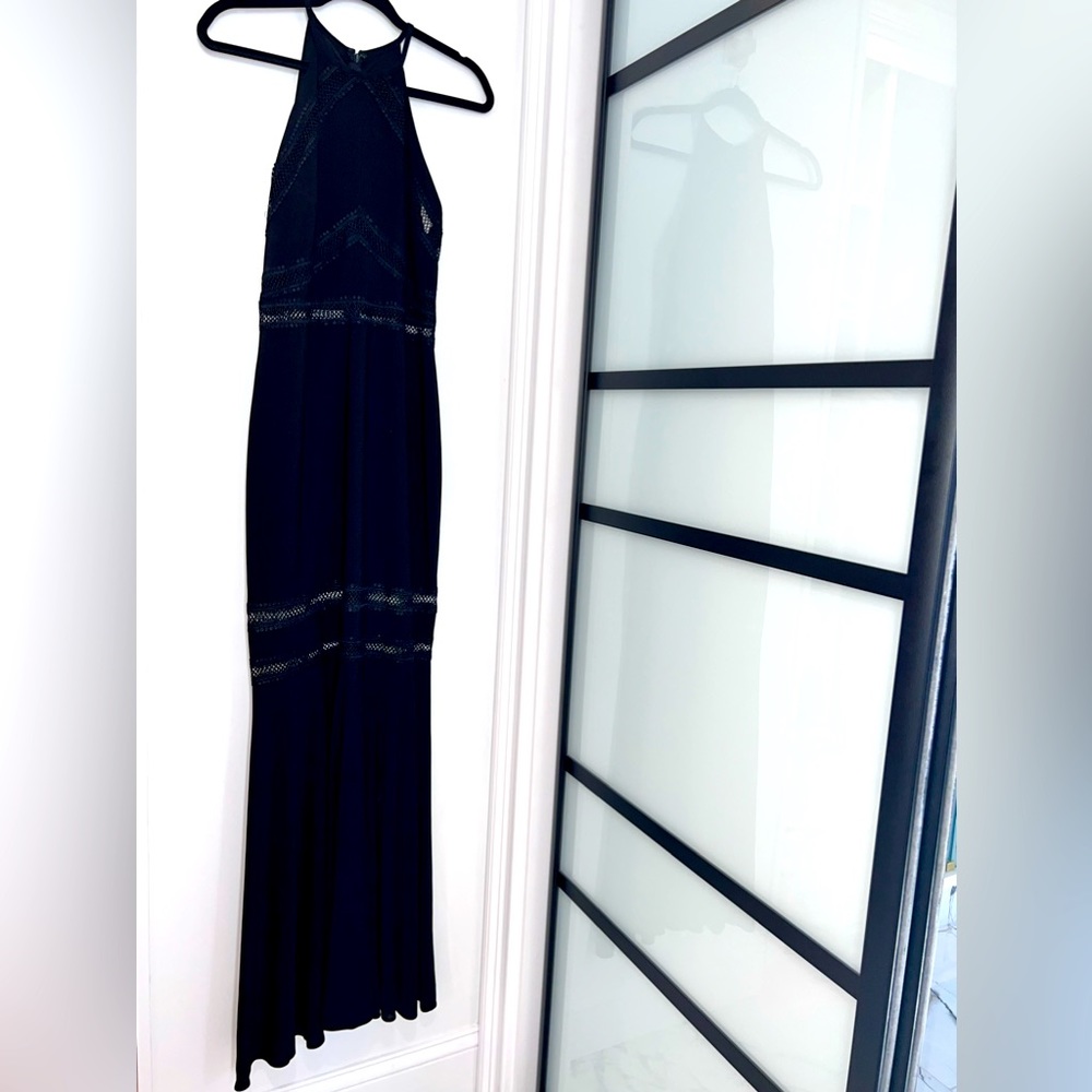 Formal Black long fitted mermaid dress with with spaghetti straps.